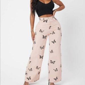 Baby pink butterfly flare jeans